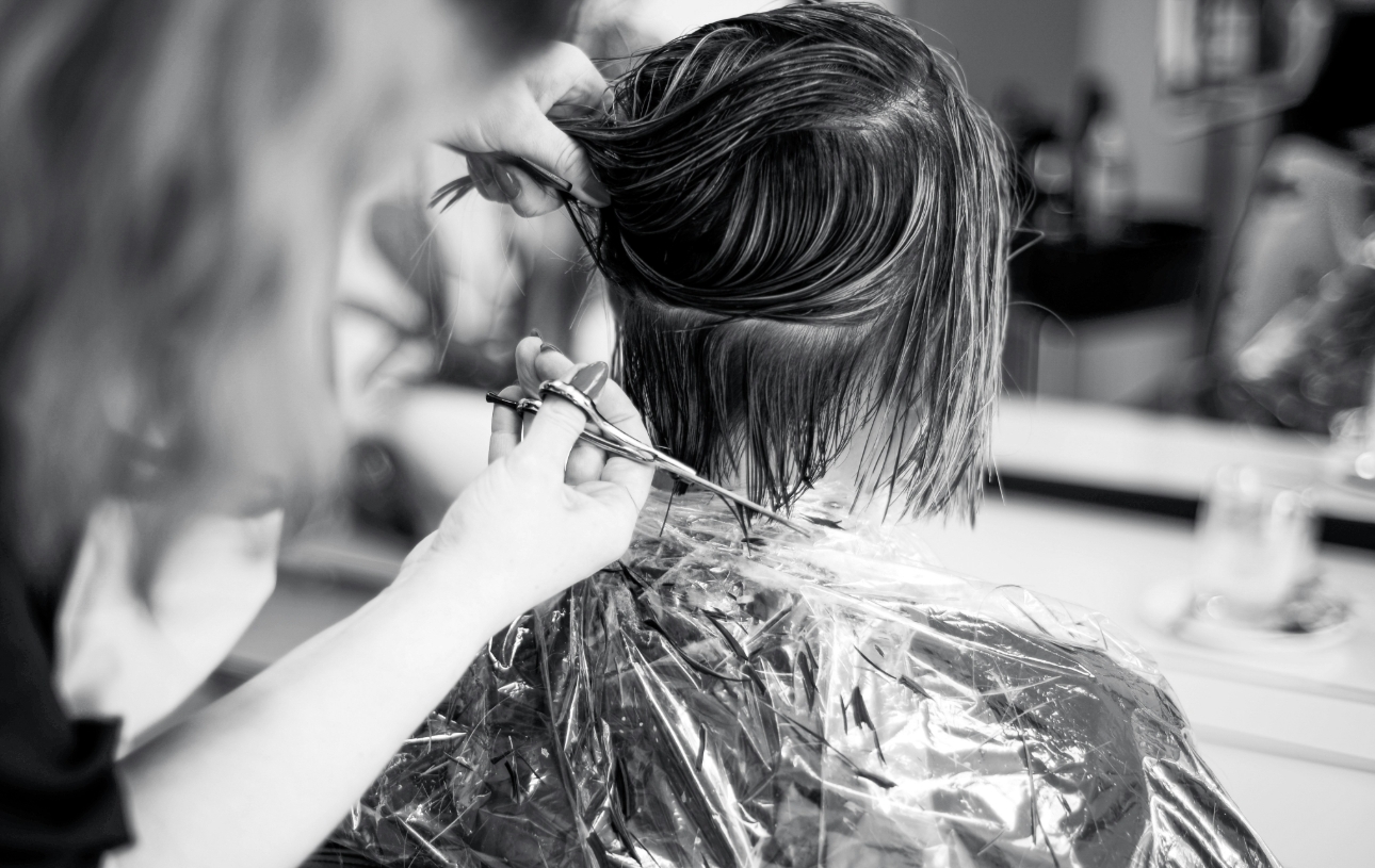 wet hair being cut
